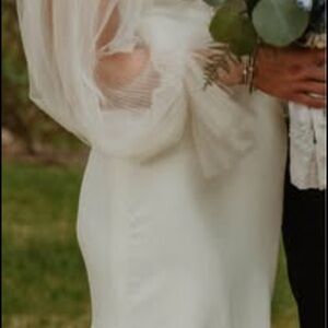 Elegant White Dress with Sheer Sleeves